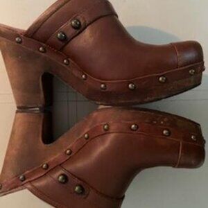 High Heeled Clogs by UGG. Very good condition.